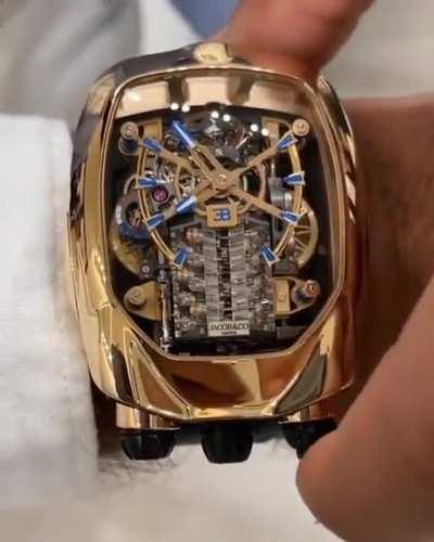 Watch that has a miniature Bugatti Chiron engine built in it (Money doesn't buy taste btw)