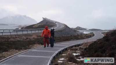 Tucked away in the midwest part of the Norwegian coastline, the coastal Atlantic Road is one of the most scenic drives in the world. The curvy road dips and arches over the brutal waves of the Norwegian Sea that often crash over the pavement during storms