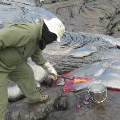 This is how a geologist collect samples from an active volcano.