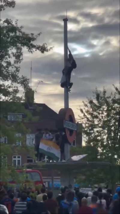 Indian Cricket Celebrations turned sour in Queensbury, NW London, after a fan fell off the London Underground sign while trying to tie an Indian flag at the top.