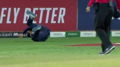 Gerhard Erasmus runs backwards and takes a brilliant one-handed tumbling catch to send back Tony Ura. Namibia vs PNG, 2019.