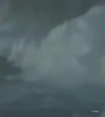 Surfer interrupted some man filming a storm