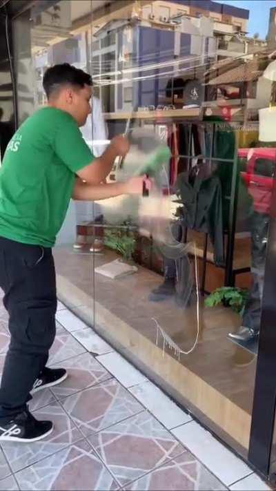 Cleaning window glass in style