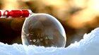 How a soap bubble freezes