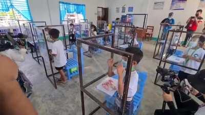 Philippines - The children are forced to wear face shields and masks in school. Dystopia