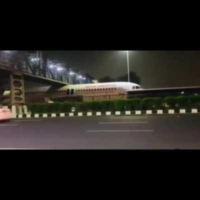 Air India plane stuck under a bridge