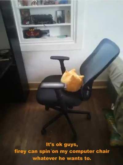 Firey is just spinning on my computer chair.