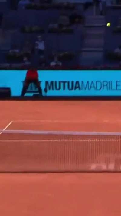 Rafael Nadal catches opponent's shot with his racket