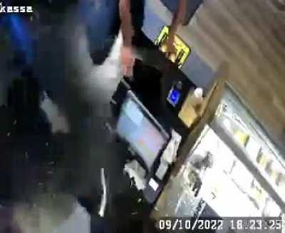 Employees apprehend a robber in my local snack bar