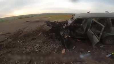 The aftermath of a Russian strike on a Ukrainian vehicle. Location and date unknown 