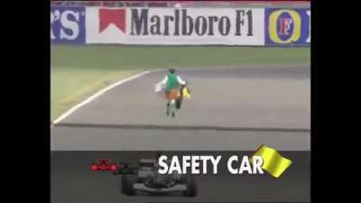 That time a Catholic priest ran across the track during a Formula 1 race waving religious banners