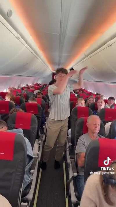 Lads doing Chinese dance tiktok trend on an aeroplane