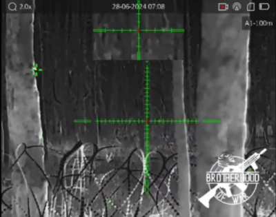 Ukrainian sniper working with a UAR-15 and HikMicro Thunder 2.0 thermal imaging sight.