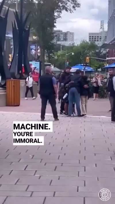 Protester calls Trudeau a &quot;Degenerate War Machine&quot;