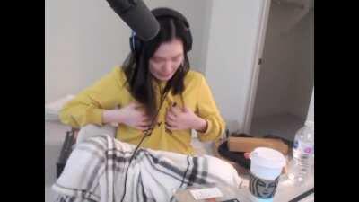 Hafu squeezing her boobs