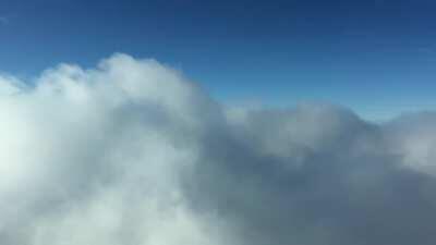 Here's a sight most airline passengers don't get to witness (stunning front row seat while flying above the cloud deck)