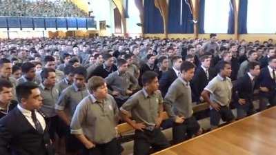 New Zealand high school students honor their retiring teacher with a Maori haka tribal dance