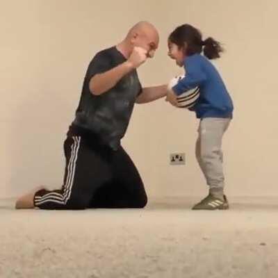 Kid finally does Soccer Trick and her Dad is so proud of her