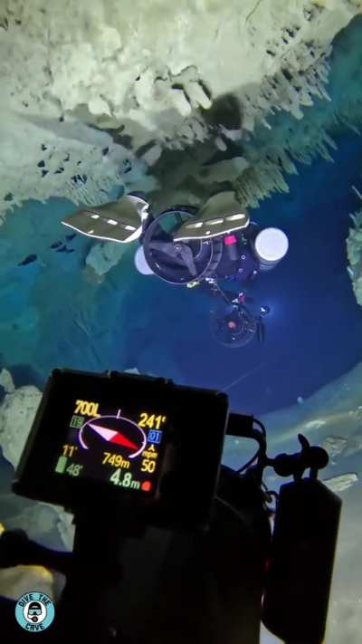 Cave diving with underwater scooters