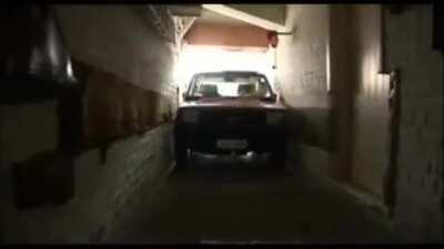 How this man parks in a garage only 6cm wider than his car.