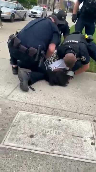 This just happened today Downtown. Police arresting a man seemingly not resisting throw him to the ground and punch him in the face repeatedly.