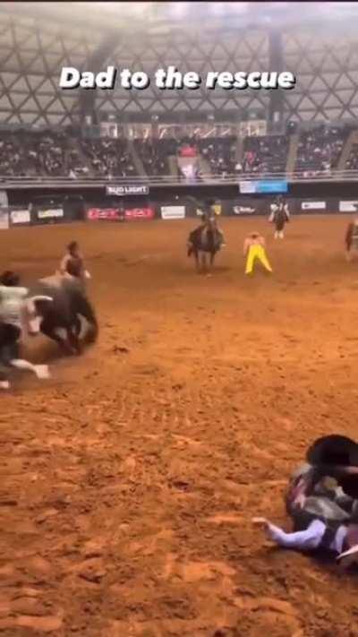 Bull rider knocked unconscious after being bucked by bull, father comes to his rescue