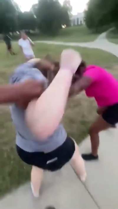 Girls fight w/ camera man jumping in 