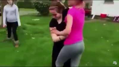 Girl Throws Shovel At Other Girl During Fight In Girls Yard