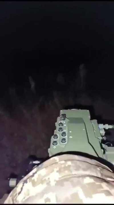 During the night, a Ukrainian soldier is firing a French Mistral MANPADS at a Russian UAV