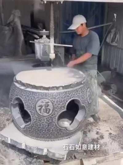 Creating these carved stone tables.