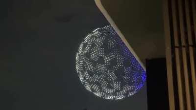 1800 drones above the National Stadium in Tokyo, Japan form a globe at the Tokyo2020 Olympics opening ceremony