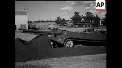 Stridsvagn 103 S-tank demonstrates digging itself into a hull-down position (1967)