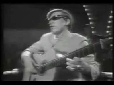 Jose Feliciano, Puerto Rican musician demostrates his talent with the guitar by playing malaguena, while being blind and then just using one hand. Around 1960s.