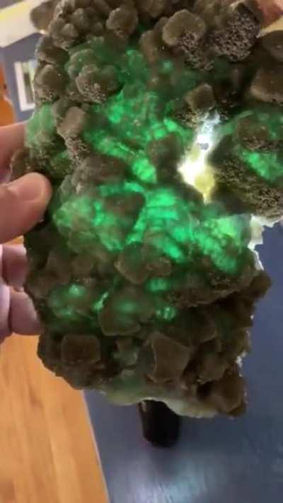 The way calcite on fluorite looks through a light source