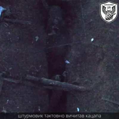 Ukrainian soldiers from the 30th Mechanized Brigade raid a Russian trench with drone support from their Aerobomber group. A surrendering Russian soldier, who assumed he would be executed after finishing his cigarette, is taken prisoner. Presumably in the 