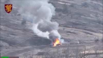 Overview, drone dropped grenades and burning vehicles after Russian attacks towards Terny, west of Kreminna. March 2024