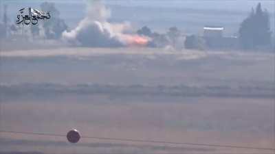 Opposition BGM-71 TOW team hits an SAA vehicle moving between al-Qarqour & al-Ziyara, sending it tumbling - 7/30/2015