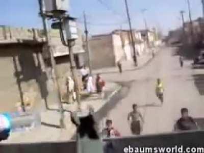 American Soldiers Tease Iraqi Kids With Water