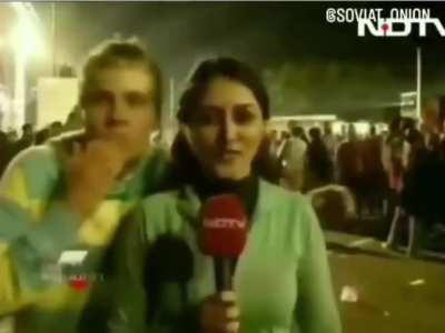 Bunch of caucasian dudes interupting a female Indian reporter