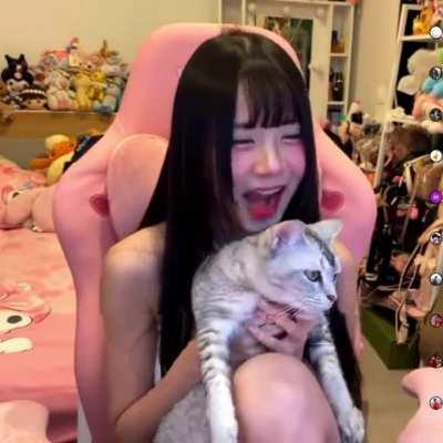 Ice with her lucky cat