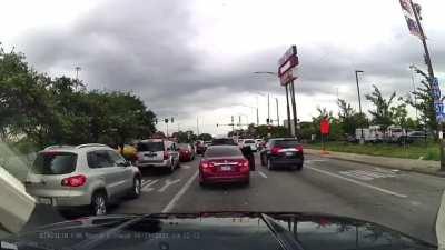 Homicidal idiots in a Nissan shooting at two women that are stopped at a red light