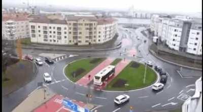 This Bus-lane in Sweden goes through roundabout.