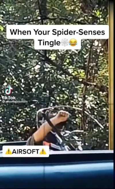 Airsoft player senses anothet player aiming at him and catches pellet with bare hand(must've hurt like a B)