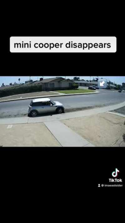 mini cooper dissappears and no the video wasnt messed with and i dont see no glitch.