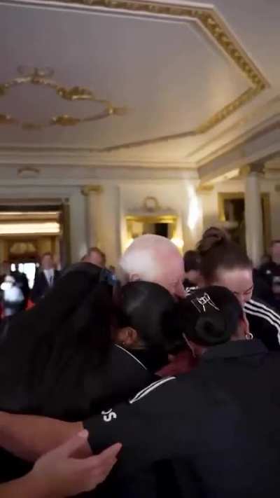 New Zealand's women's rugby team give King Charles a group hug