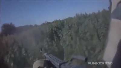 USMC machine gunner sprays M240b at Taliban position after being ambushed - War Monitor Clips