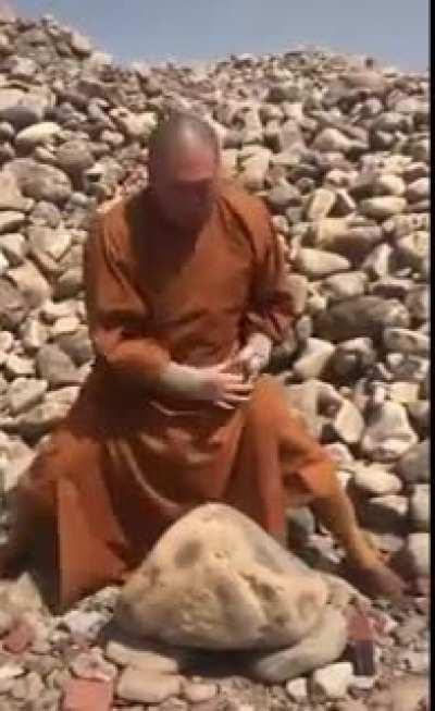 Monk breaks rocks with fingers