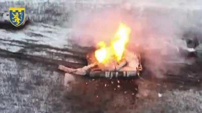 Ukrainian drone destroys an abandoned Russian tank. January 2024 (music from source)