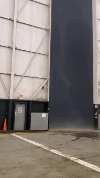 Rain Storm in Alabama outside this factory door