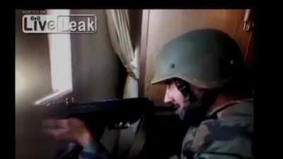 Syrian Soldier sniped in the head by either Rebel fighters or ISIS Militants.